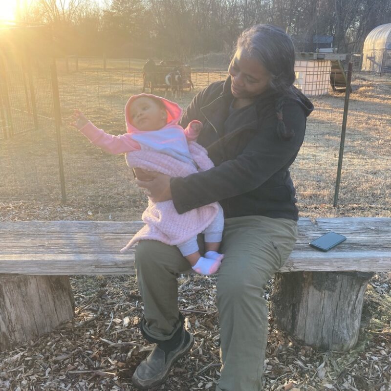 Baby reaching for a sunbeam